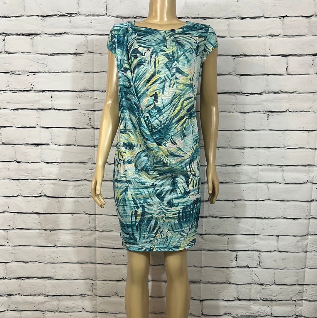 Whether you're dressing up for a special occasion or simply running errands around town, the Parkhurst Half Cowl Dress is a must-have addition to your wardrobe. Its timeless design and comfortable fit make it a piece you'll wear again and again.